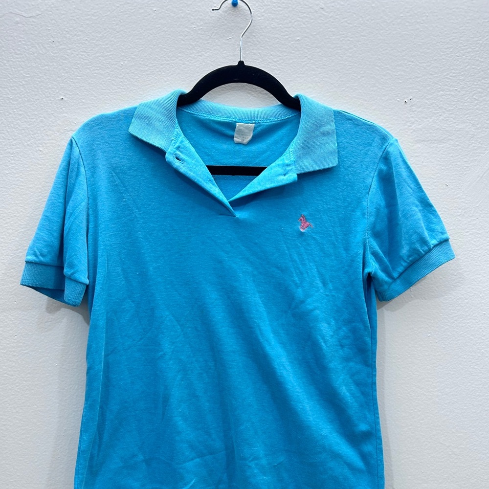 Blue Polo Shirt with Pink Logo